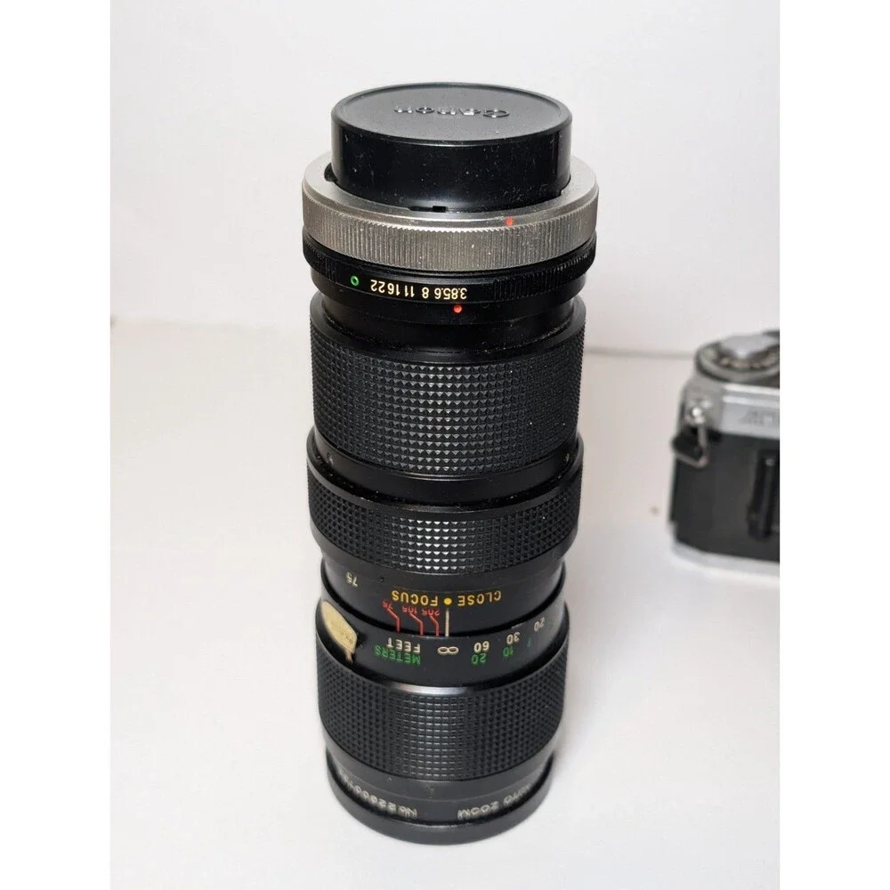 Canon AT-1 35mm Film Camera + 50mm f/1.8 Lens and Vivitar 75-205mm f/3.8 lens
